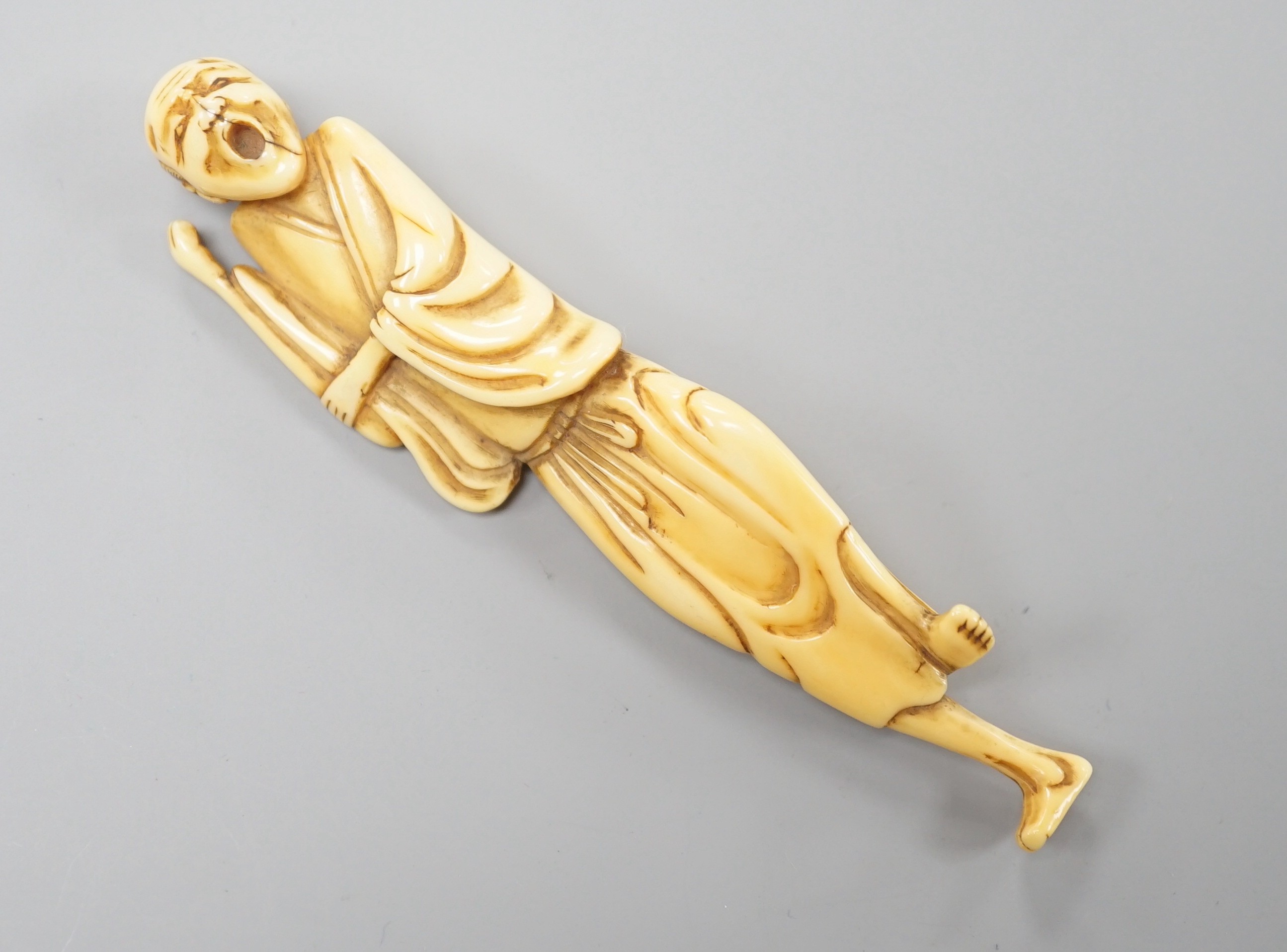 A Japanese ivory netsuke of a howling man, late 18th/early 19th century, 9.4cm